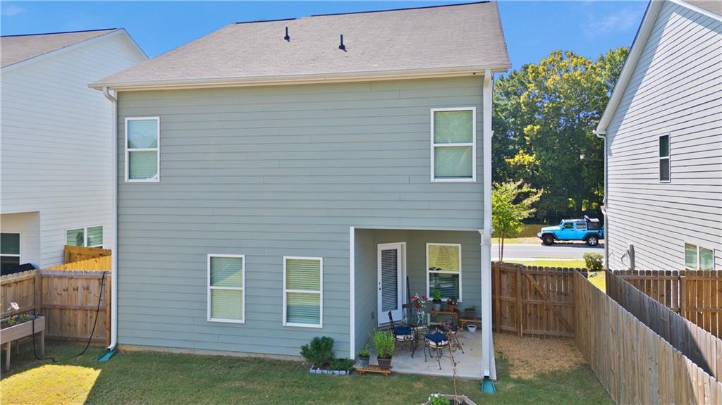 103 Waterside Drive Calhoun, GA 30701 - Photo 37 of 48 a view of a house with yard and furniture