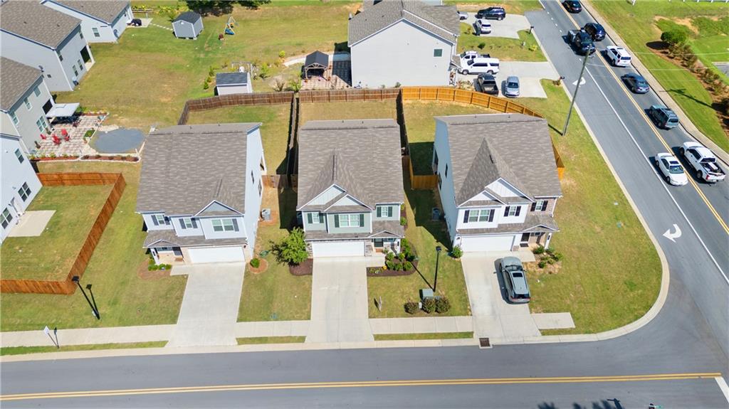 103 Waterside Drive Calhoun, GA 30701 - Photo 43 of 48 an aerial view of residential houses with yard