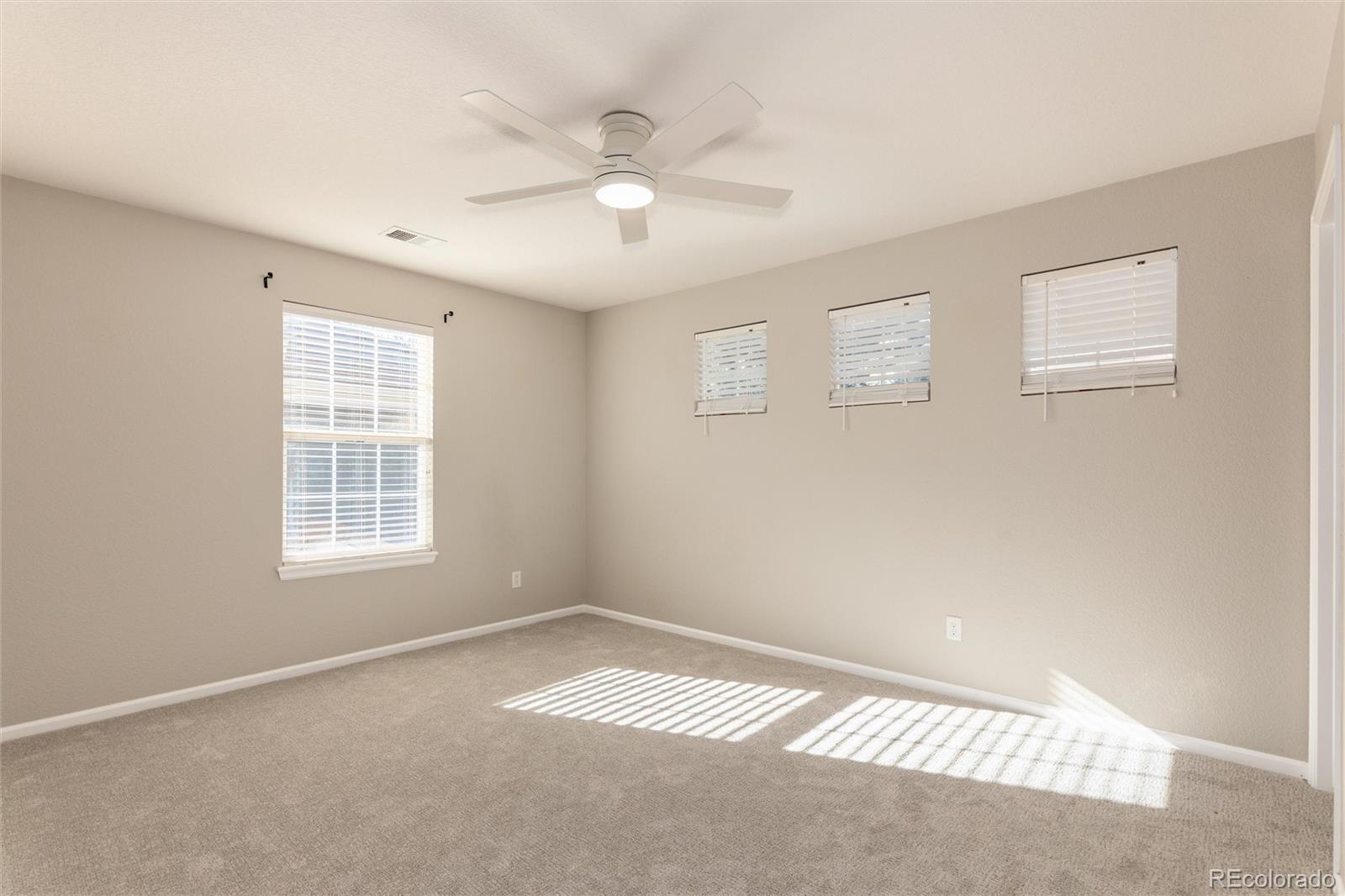 10820 Montvale Circle Highlands Ranch, CO 80130 - Photo 27 of 50 a view of an empty room with a window