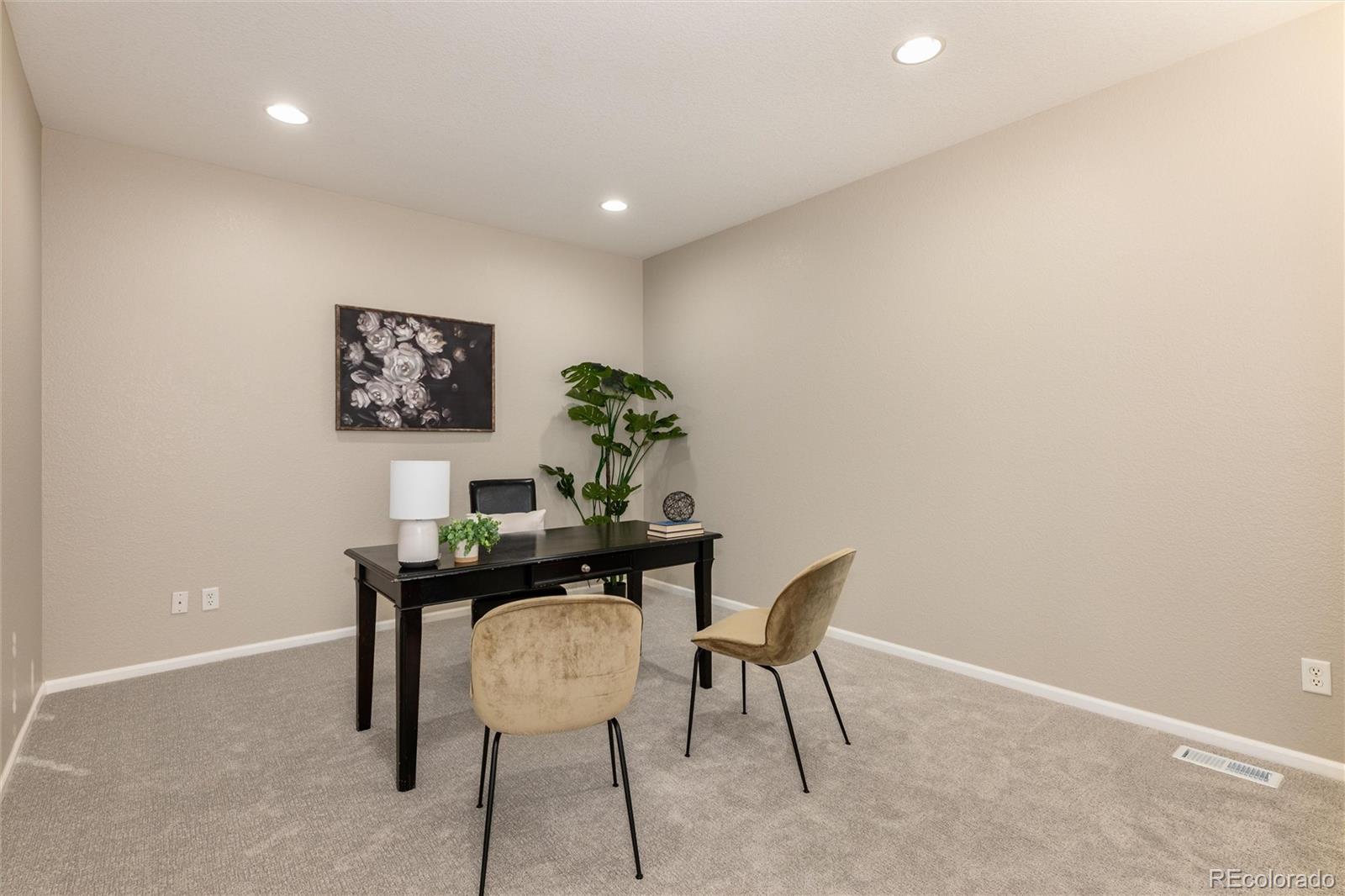 10820 Montvale Circle Highlands Ranch, CO 80130 - Photo 4 of 50 a view of a workspace with furniture