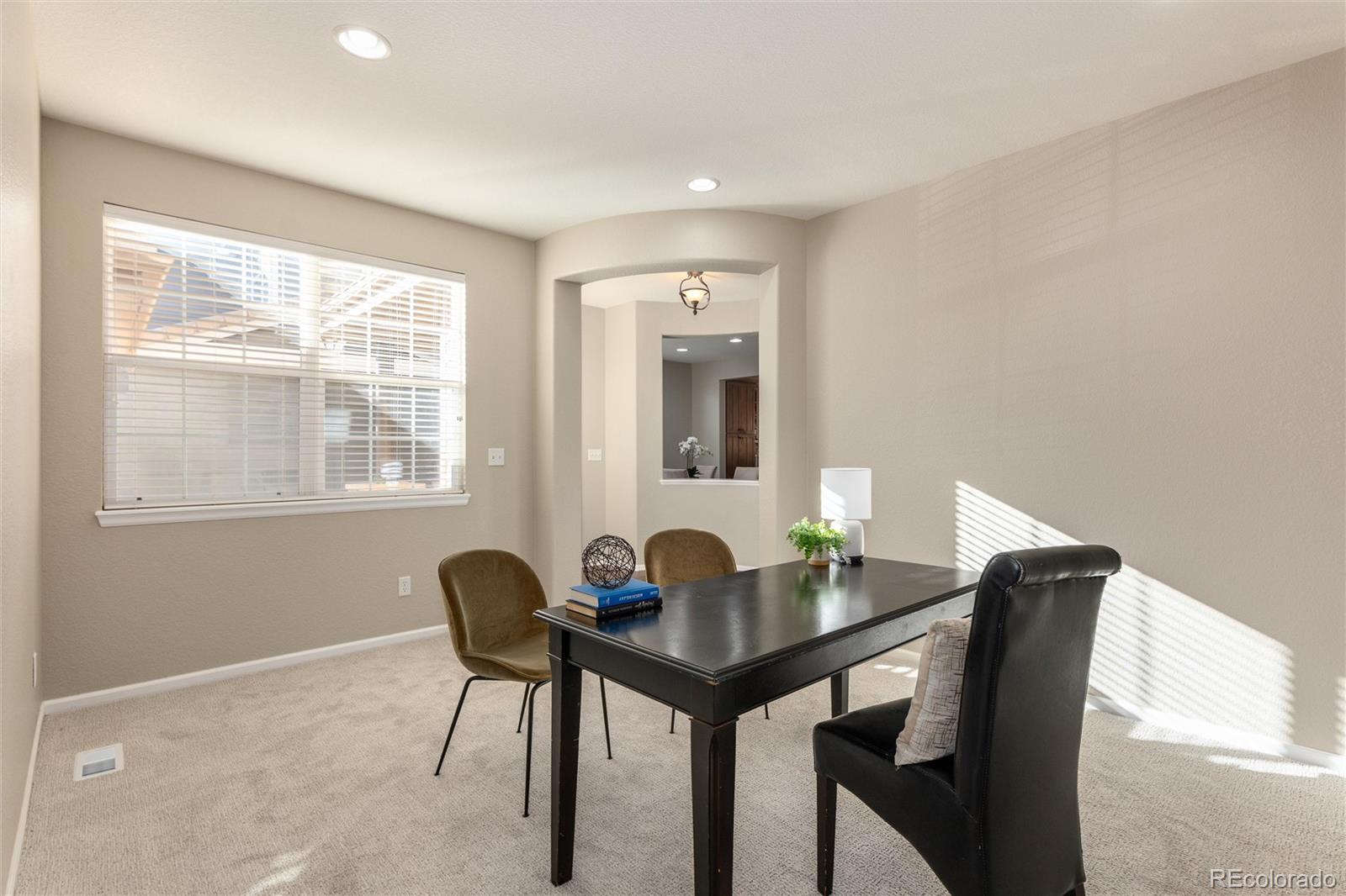 10820 Montvale Circle Highlands Ranch, CO 80130 - Photo 5 of 50 a workspace room with furniture and window