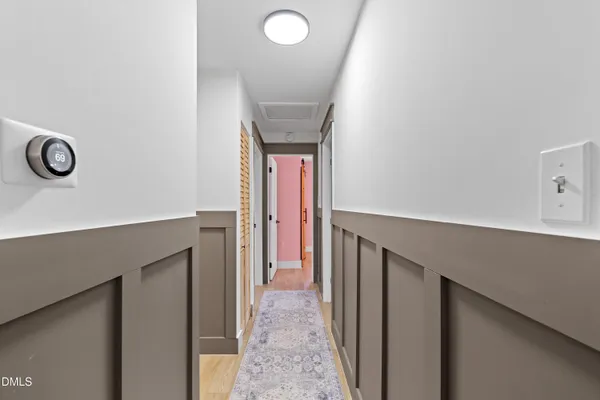 a view of entryway with wooden floor