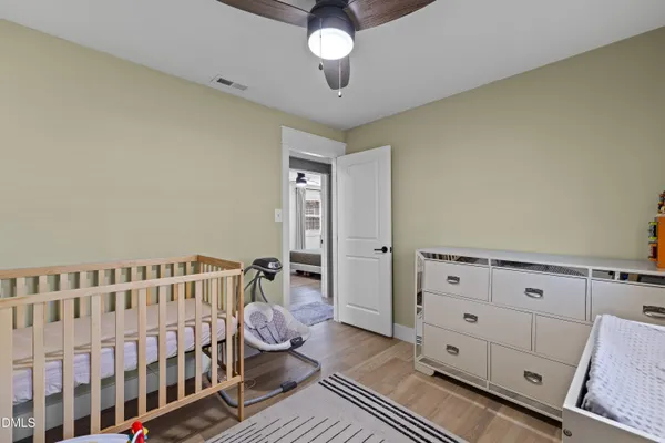 a bedroom with furniture and a bed