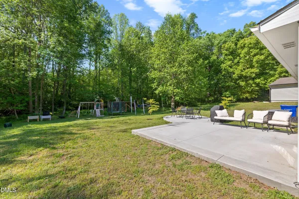 a house view with sitting space and garden space