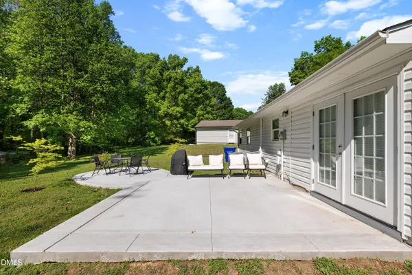 front view of a house with a patio