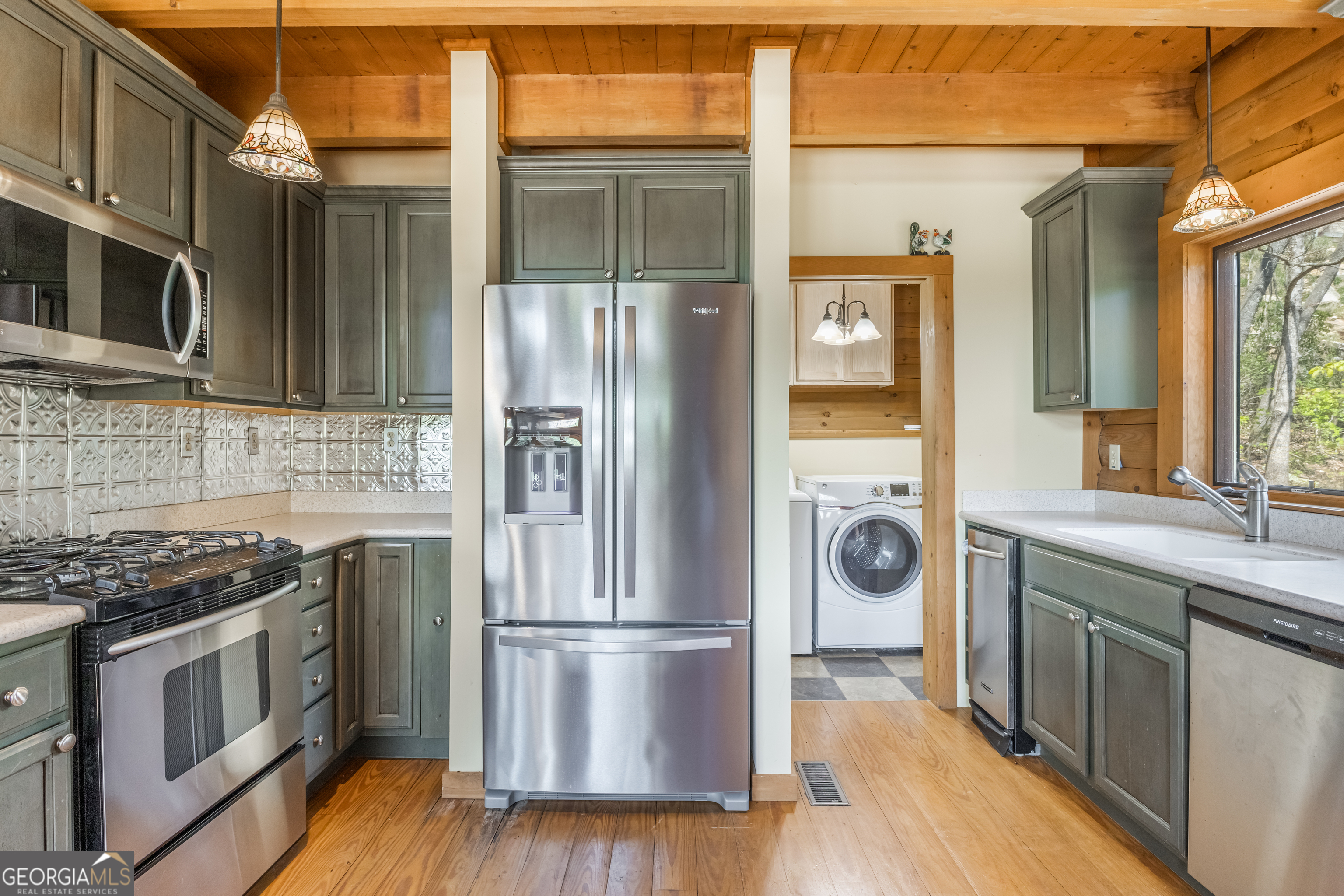 159 Eagle Creek Trail Rising Fawn, GA 30738 - Photo 15 of 37 a kitchen with stainless steel appliances granite countertop a refrigerator a stove and a wooden floors