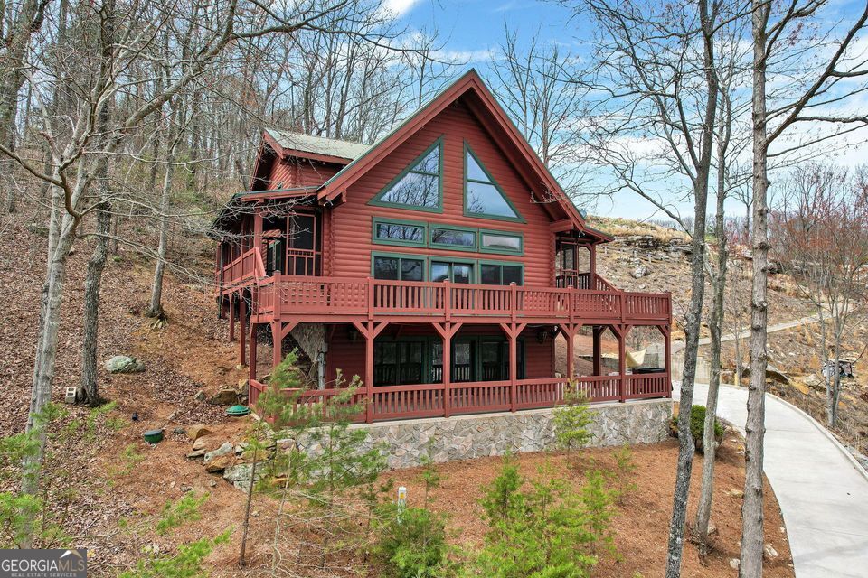 159 Eagle Creek Trail Rising Fawn, GA 30738 - Photo 2 of 37 a front view of a house with garden