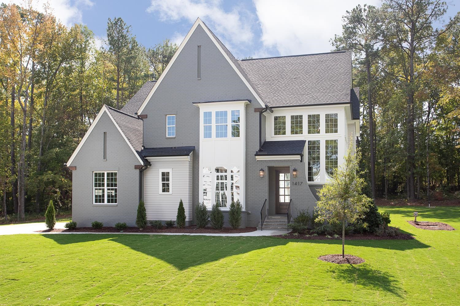 1417 Starry Night Court Raleigh, NC 27613 - Photo 1 of 44 a front view of a house with a yard