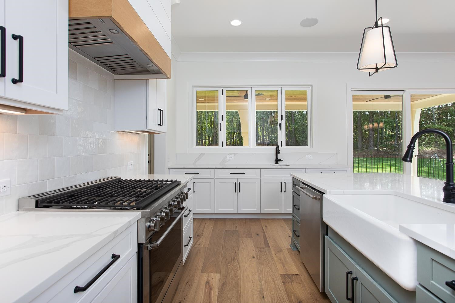 1417 Starry Night Court Raleigh, NC 27613 - Photo 20 of 44 a kitchen that has a sink and a stove