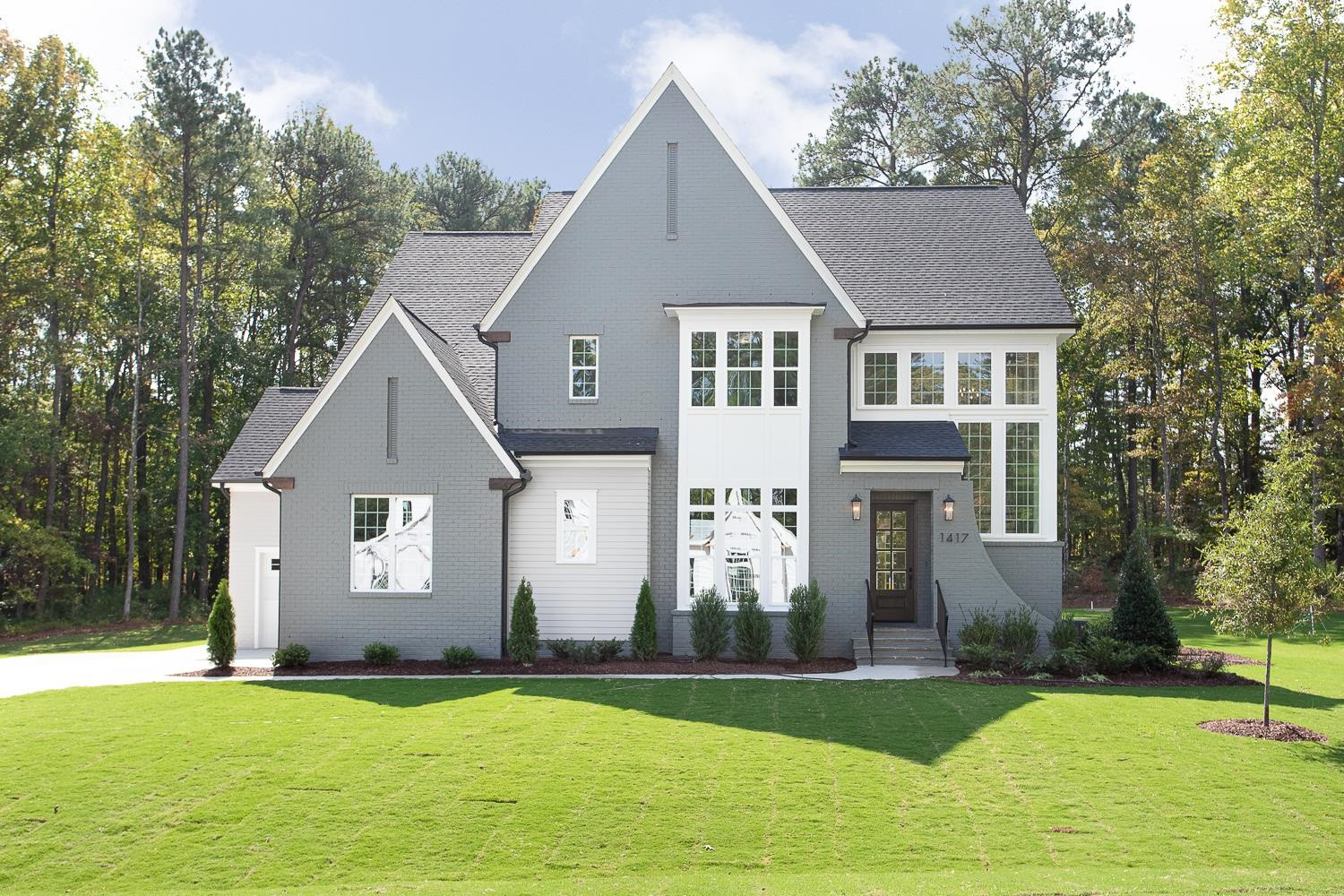 1417 Starry Night Court Raleigh, NC 27613 - Photo 2 of 44 a front view of a house with a yard