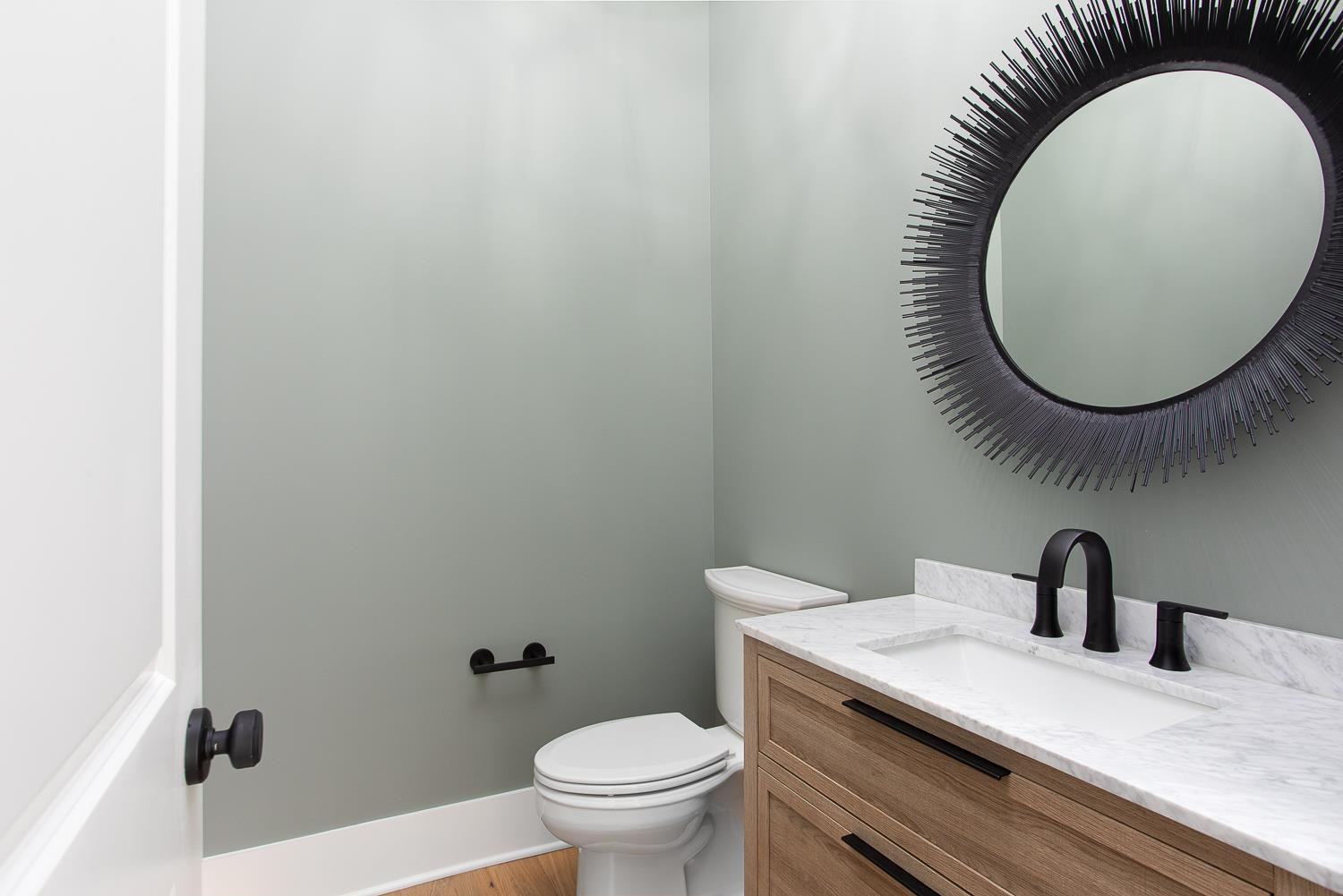 1417 Starry Night Court Raleigh, NC 27613 - Photo 23 of 44 a bathroom with a toilet and a sink