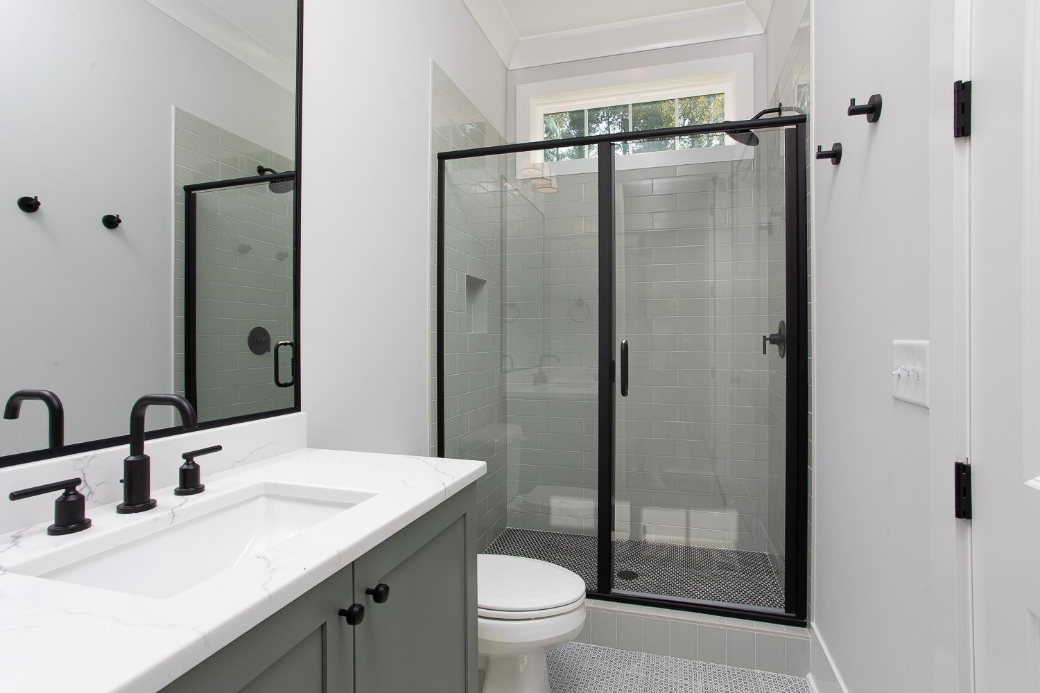 1417 Starry Night Court Raleigh, NC 27613 - Photo 24 of 44 a bathroom with a sink toilet and shower