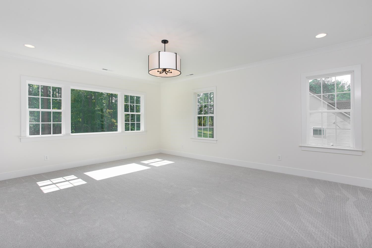 1417 Starry Night Court Raleigh, NC 27613 - Photo 28 of 44 a view of an empty room with a window