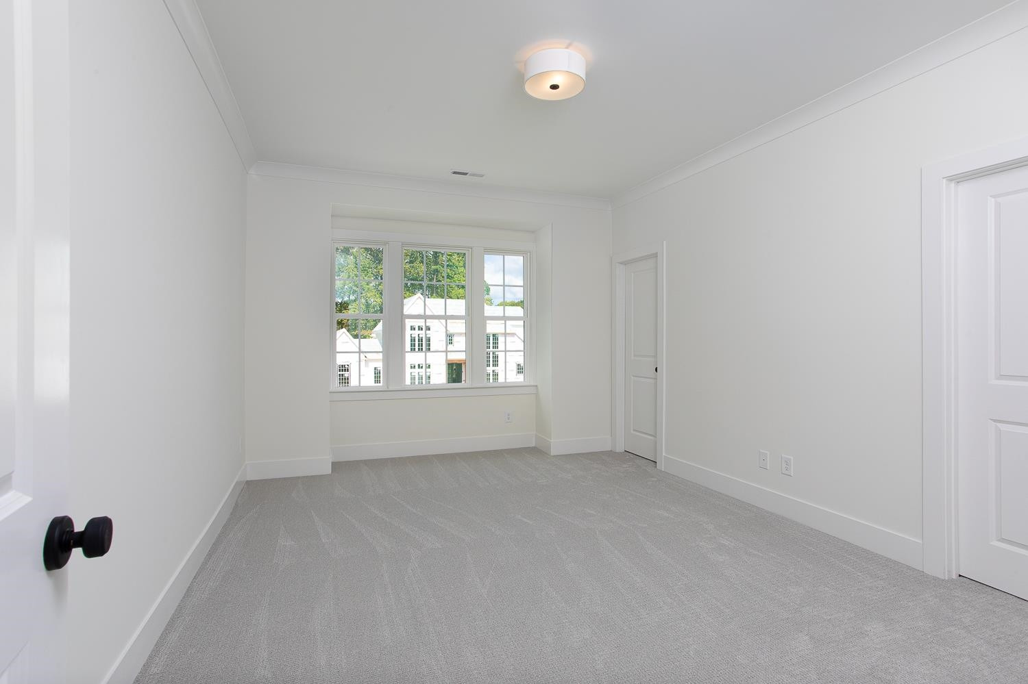 1417 Starry Night Court Raleigh, NC 27613 - Photo 35 of 44 an empty room with a window