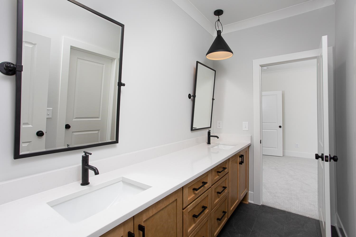 1417 Starry Night Court Raleigh, NC 27613 - Photo 36 of 44 a bathroom with a sink and a mirror