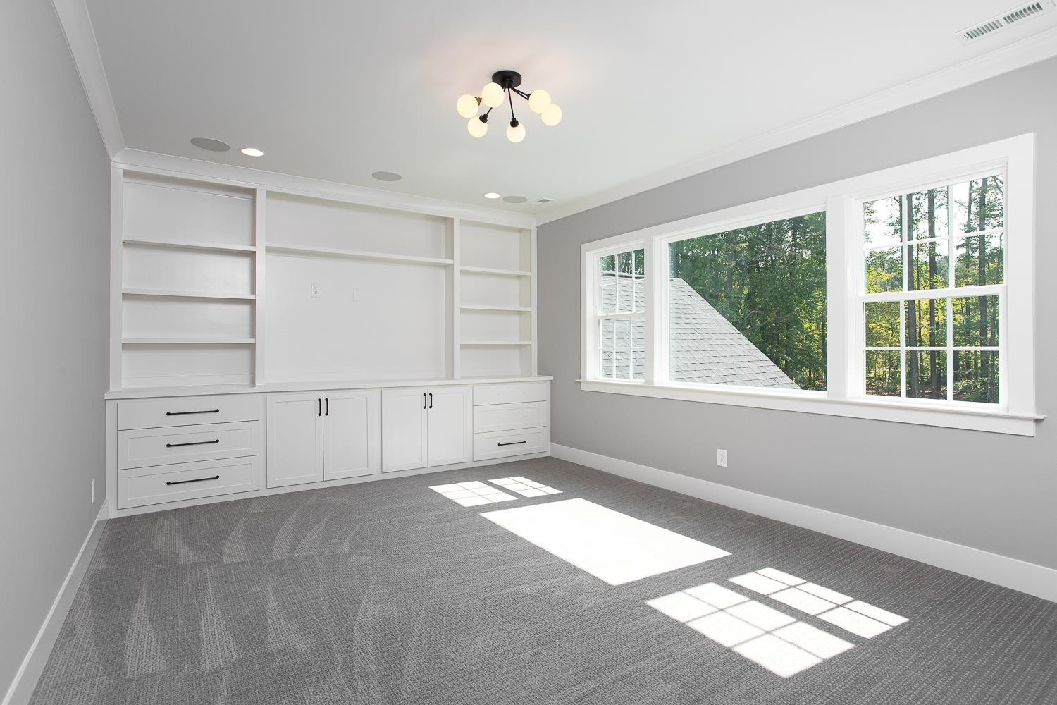 1417 Starry Night Court Raleigh, NC 27613 - Photo 39 of 44 a view of an empty room with a window