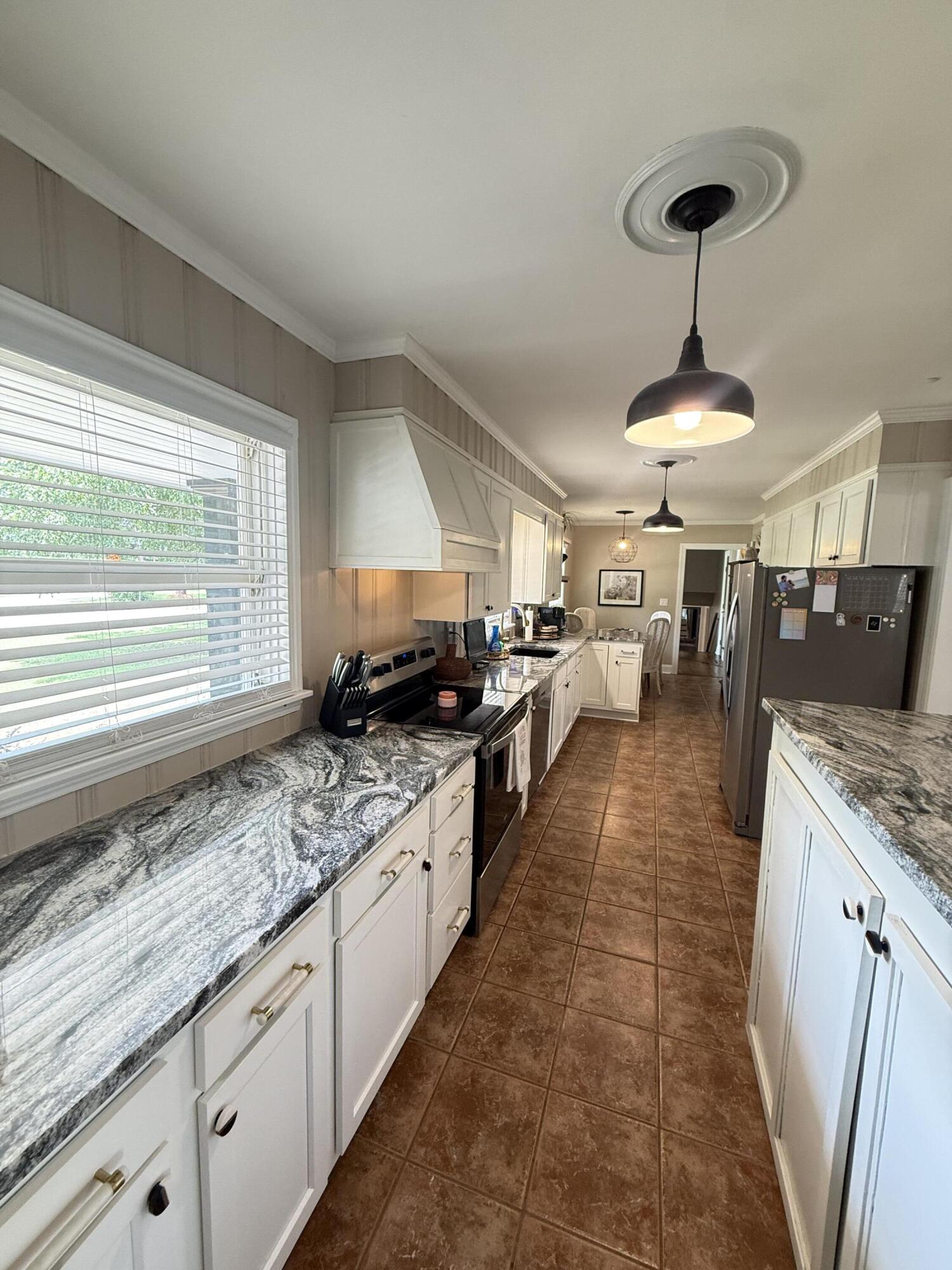31 Riley Street Sumter, SC 29150 - Photo 31 of 65 kitchen with lots of cabinets and counter space.