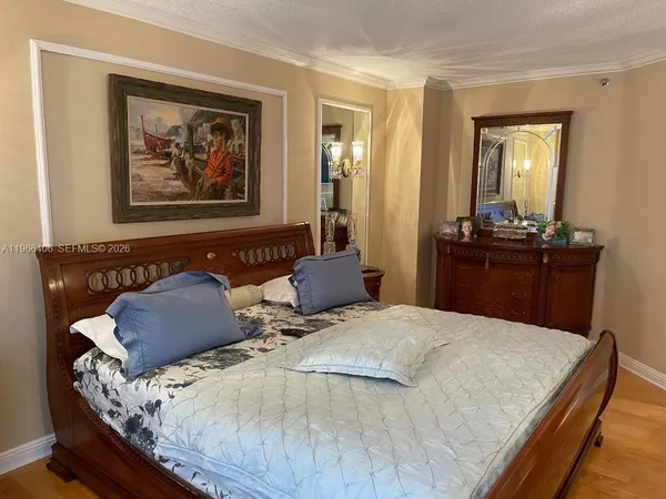 a view of a room with furniture and front door