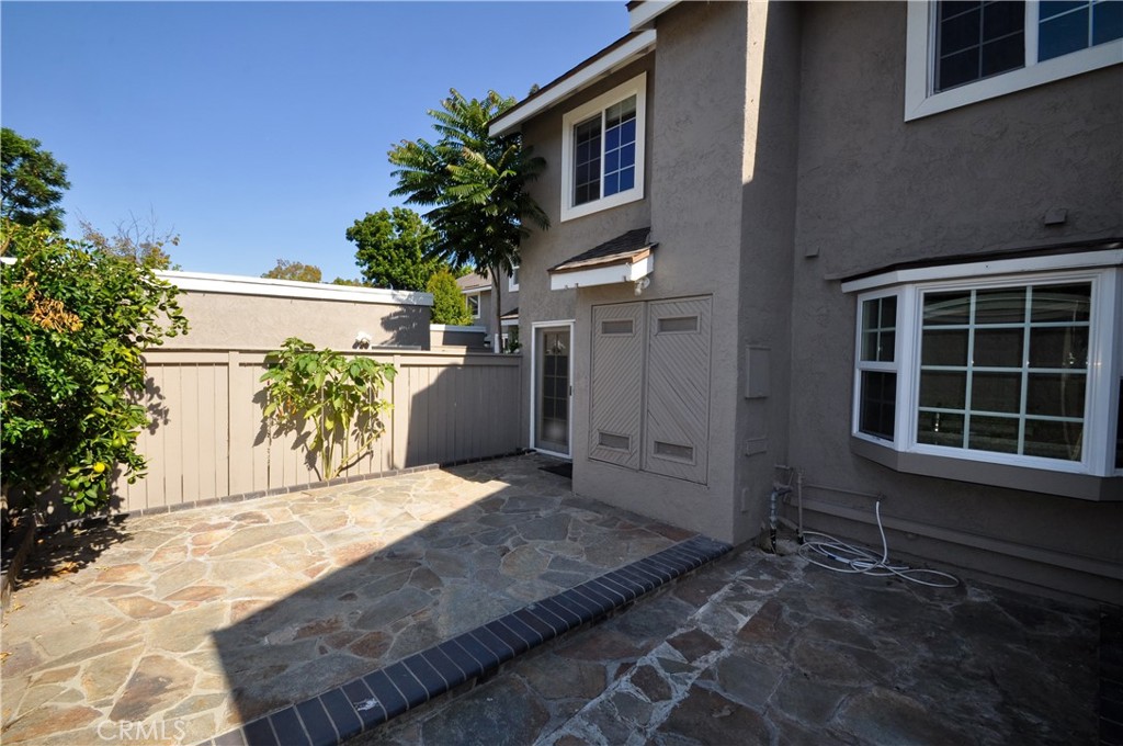 6 Pendelton Irvine, CA 92620 - Photo 17 of 18 a view of front door and potted plants