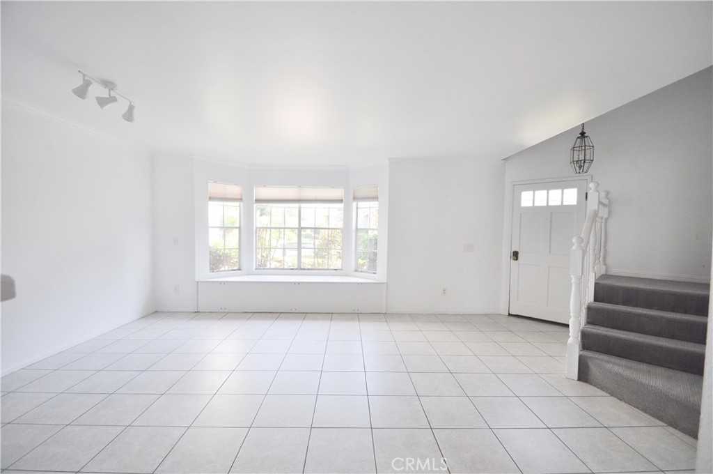 6 Pendelton Irvine, CA 92620 - Photo 2 of 18 a view of an empty room with a window