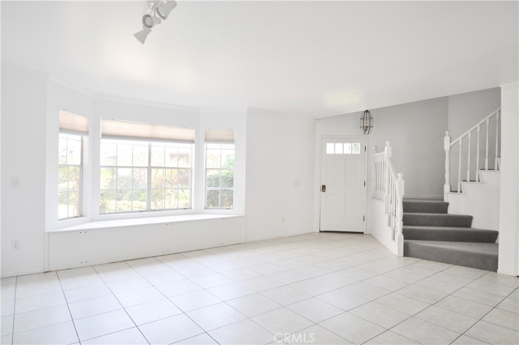 6 Pendelton Irvine, CA 92620 - Photo 4 of 18 a view of an empty room with a window