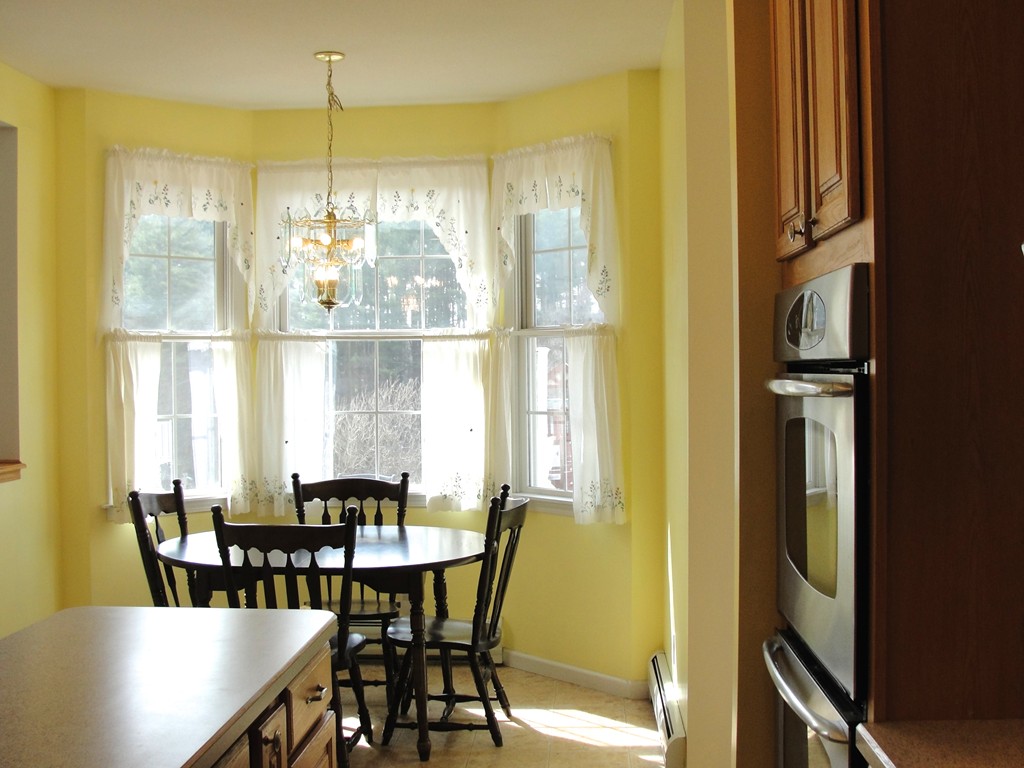 79 Valley Road Southampton, MA 01073 - Photo 13 of 30 a view of a dining room with furniture and window