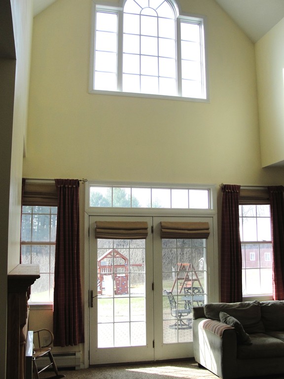 79 Valley Road Southampton, MA 01073 - Photo 15 of 30 a living room with furniture and large windows
