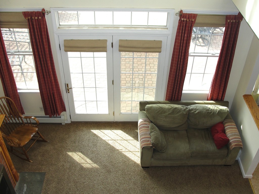 79 Valley Road Southampton, MA 01073 - Photo 16 of 30 a living room with furniture and a window
