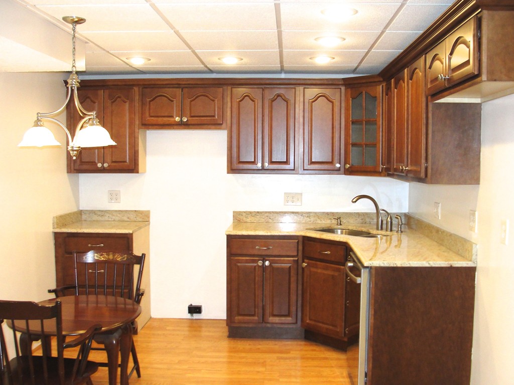 79 Valley Road Southampton, MA 01073 - Photo 20 of 30 a kitchen with a sink and cabinets
