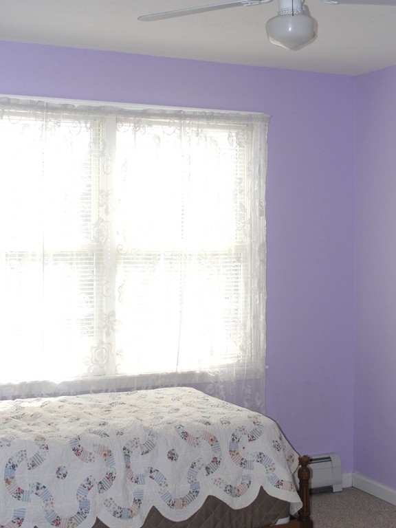 79 Valley Road Southampton, MA 01073 - Photo 26 of 30 a bedroom with a bed and a window