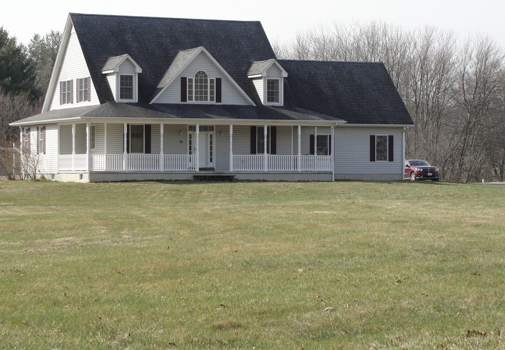 79 Valley Road Southampton, MA 01073 - Photo 3 of 30 a front view of a house with a yard