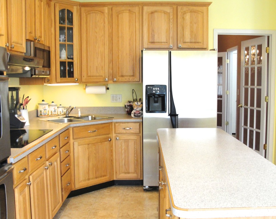 79 Valley Road Southampton, MA 01073 - Photo 9 of 30 a kitchen with stainless steel appliances a refrigerator and sink