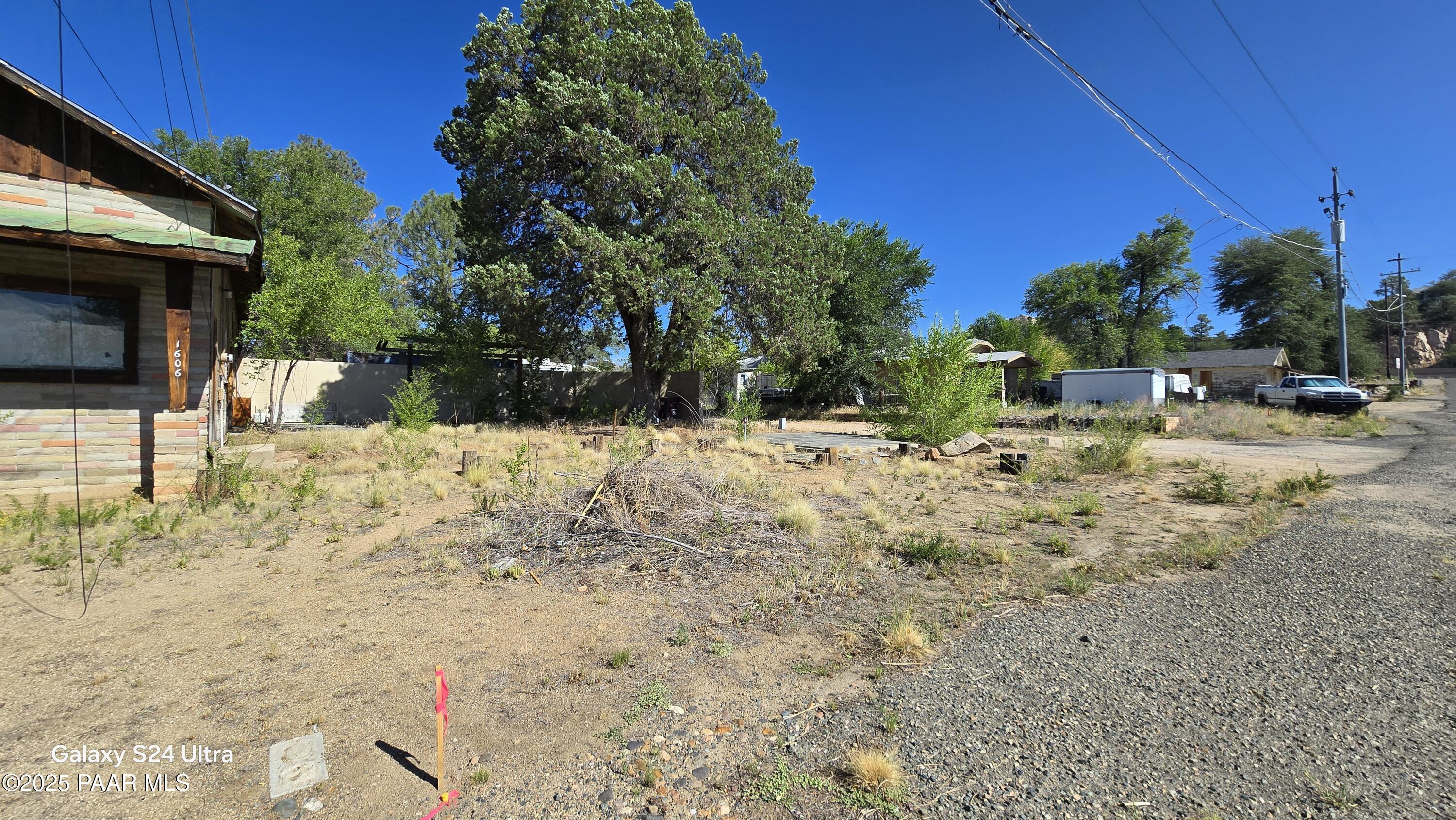 1628 Kile Street Prescott, AZ 86305 - Photo 9 of 11 a view of a yard with snow on the road