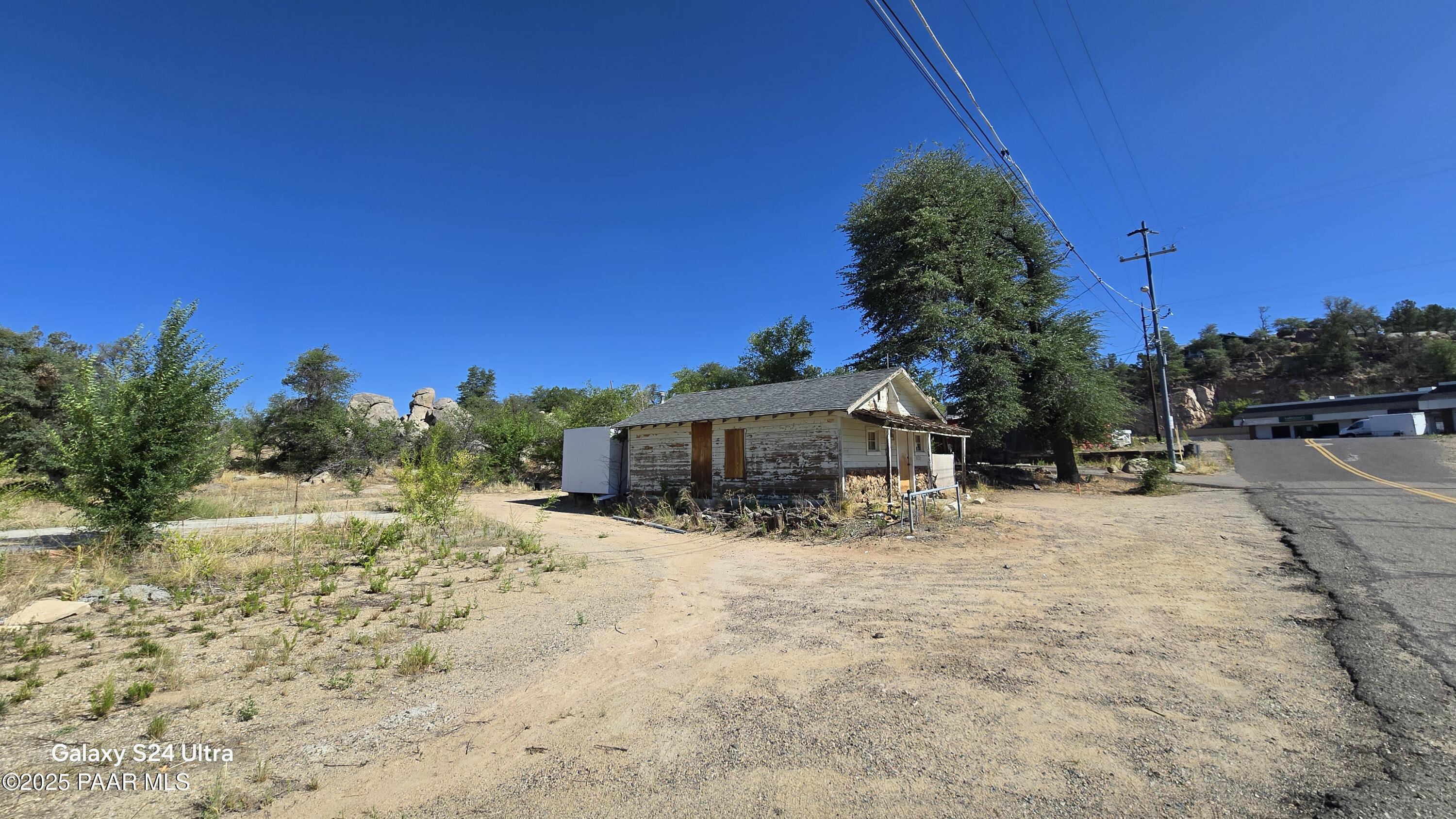 1628 Kile Street Prescott, AZ 86305 - Photo 10 of 11 a view of a house with a yard