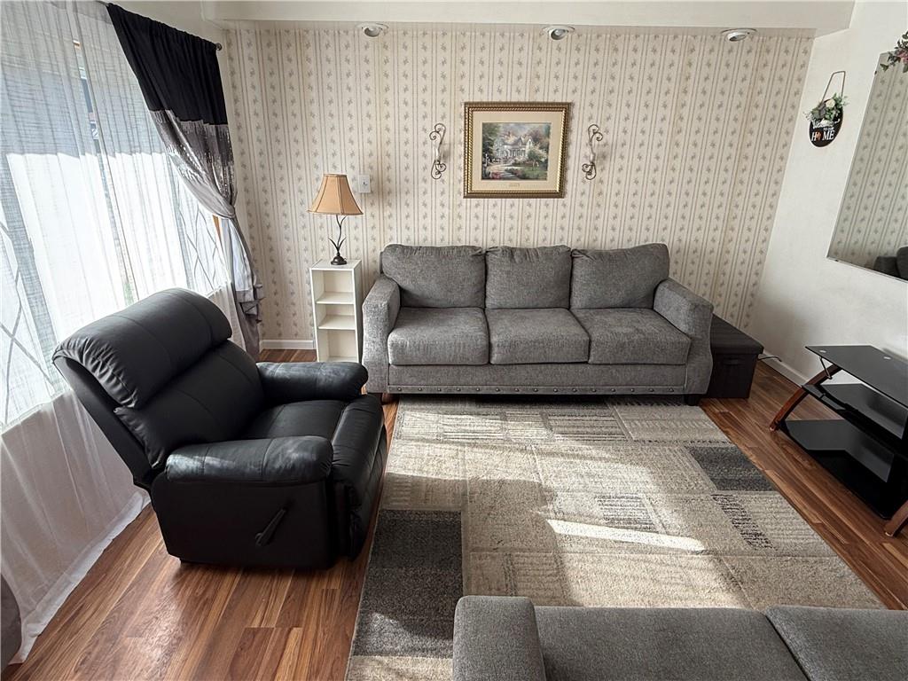 512 Watson Street Vandergrift, PA 15690 - Photo 12 of 35 a living room with furniture and a rug