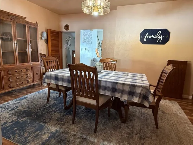 a view of a dining room with furniture