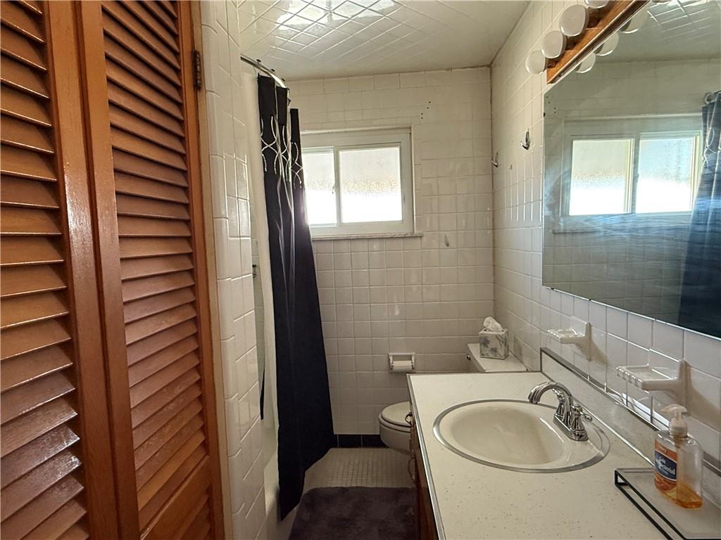 512 Watson Street Vandergrift, PA 15690 - Photo 23 of 35 a bathroom with a sink and a mirror