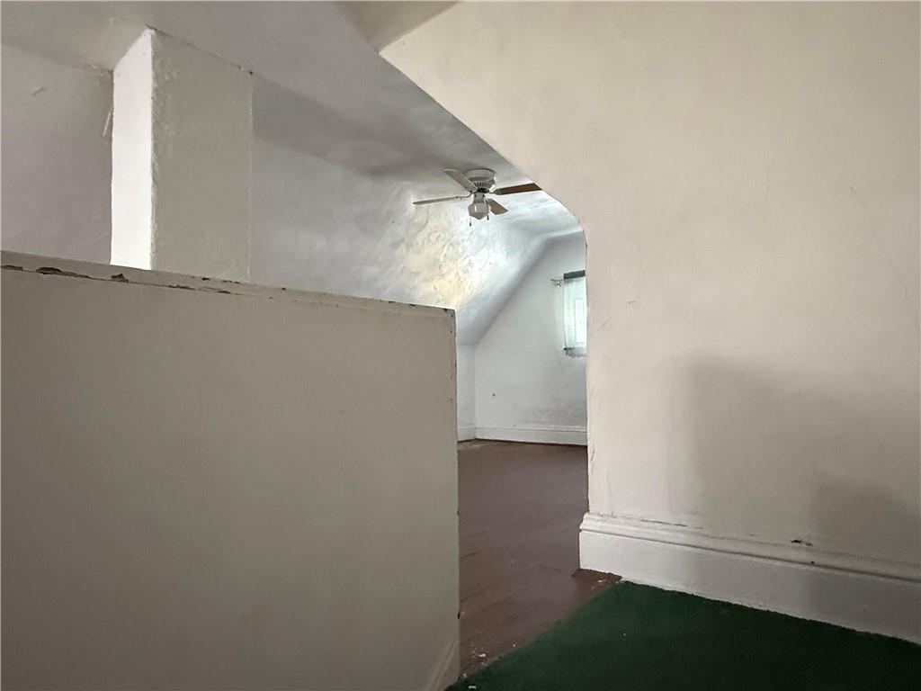 512 Watson Street Vandergrift, PA 15690 - Photo 27 of 35 an empty room with wooden floor