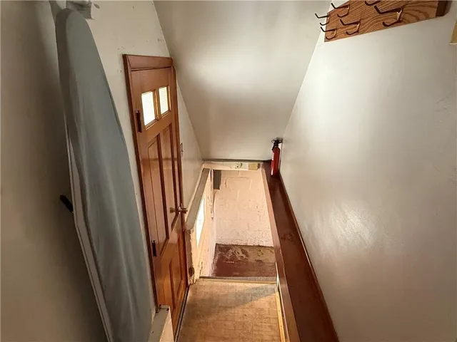 a view of a refrigerator with wooden door