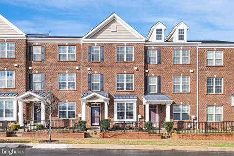 a front view of a large residential apartment building