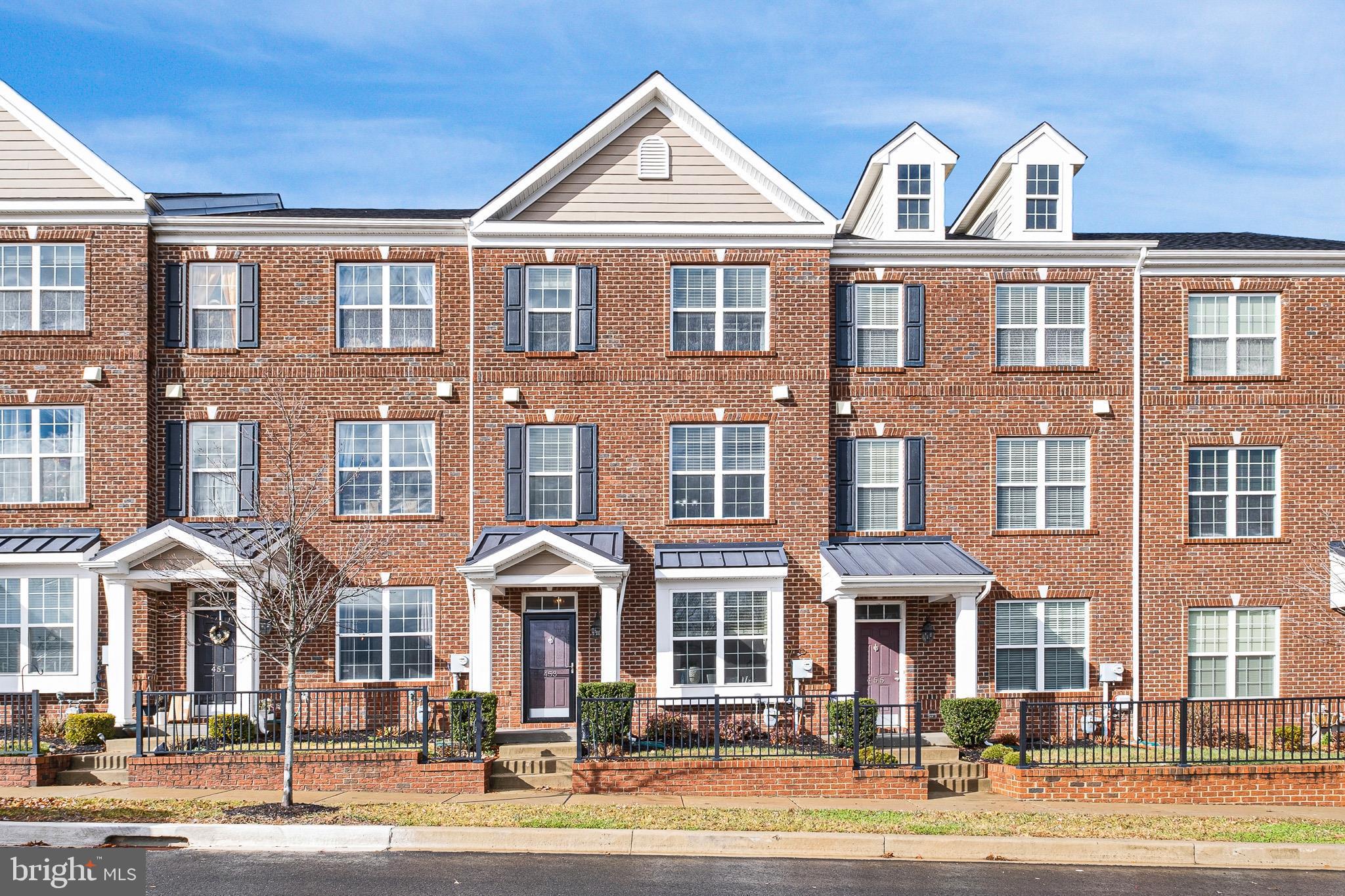 453 Lenape Way Claymont, DE 19703 - Photo 1 of 20 a front view of a large residential apartment building