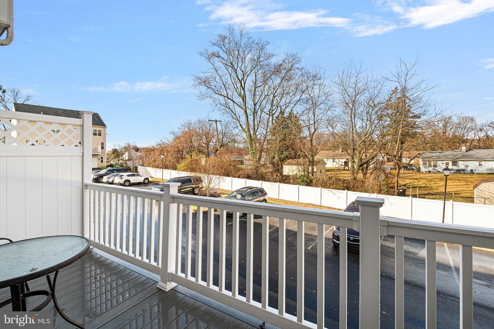 453 Lenape Way Claymont, DE 19703 - Photo 5 of 20 a view of a balcony with wooden fence and floor