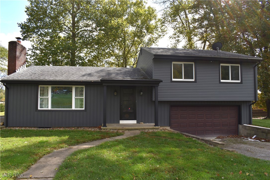 12800 North Pike Road Mount Perry, OH 43760 - Photo 1 of 29 Split level home with a front yard and a garage