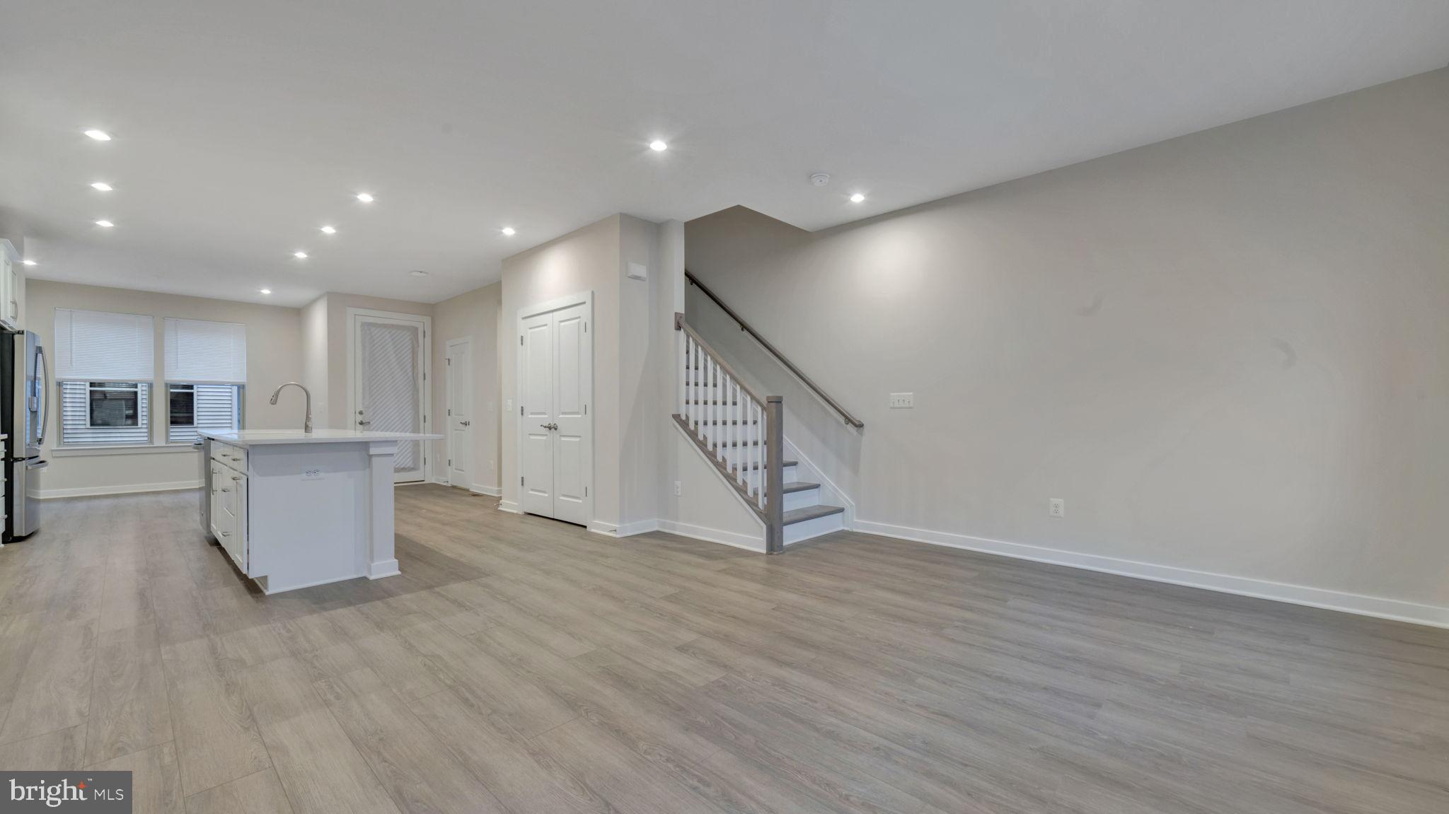 13170 Arches Road Herndon, VA 20170 - Photo 15 of 30 a view of a kitchen with furniture and wooden floor