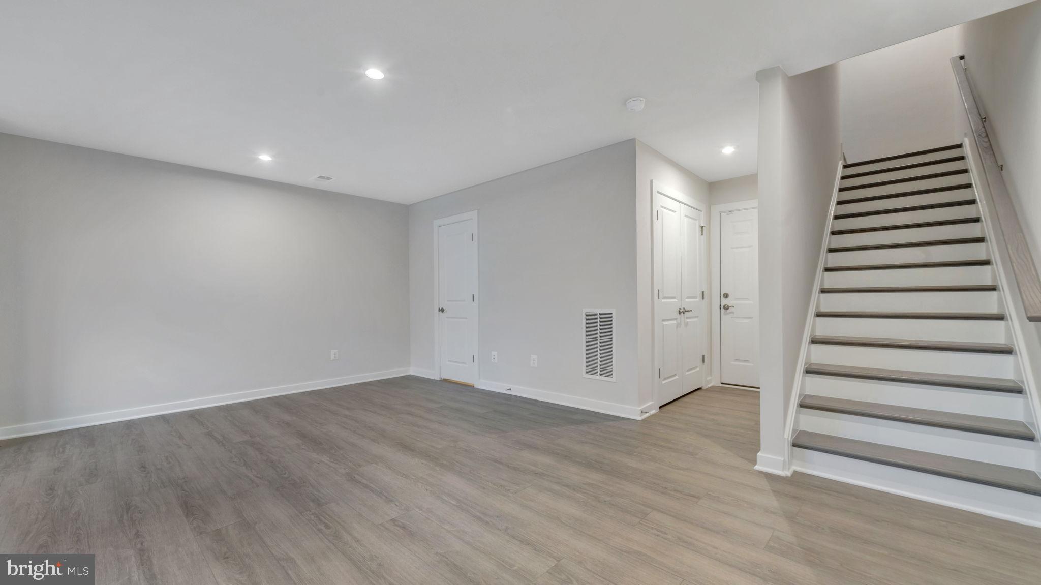 13170 Arches Road Herndon, VA 20170 - Photo 29 of 30 a view of an empty room with wooden floor