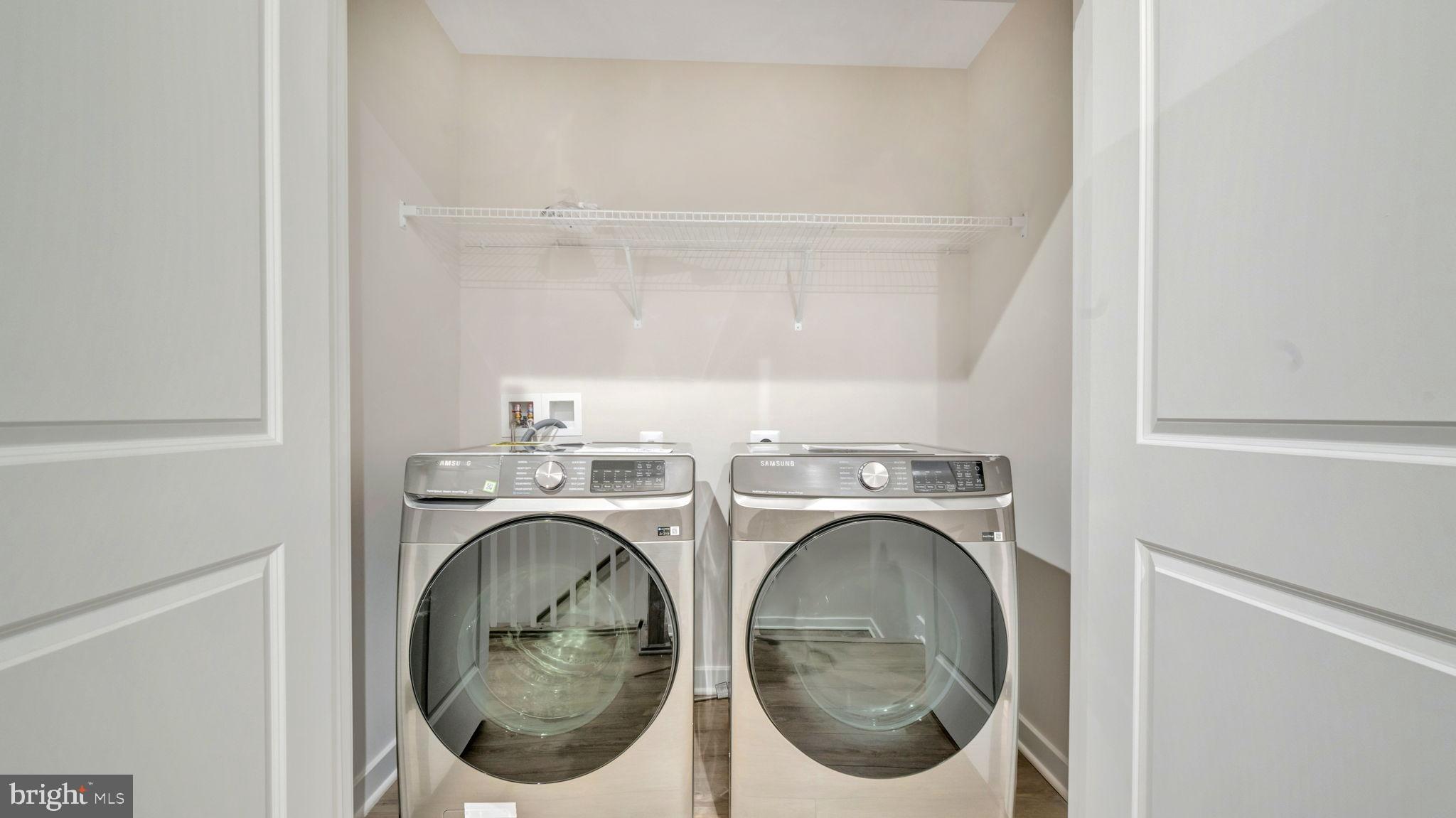 13170 Arches Road Herndon, VA 20170 - Photo 7 of 30 a utility room with dryer and washer