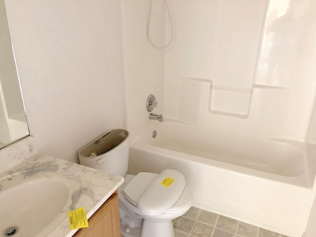 10 Alexander Loop Phenix City, AL 36869 - Photo 11 of 15 a bathroom with a sink and a bathtub