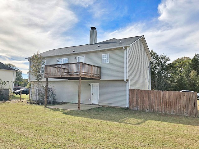10 Alexander Loop Phenix City, AL 36869 - Photo 3 of 15 a view of a backyard of the house