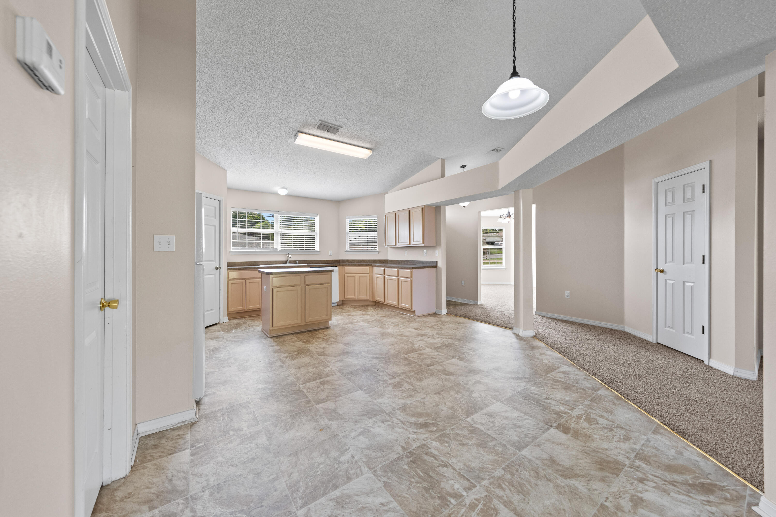 275 Limestone Circle Crestview, FL 32539 - Photo 15 of 45 a view of a kitchen with an oven and cabinets