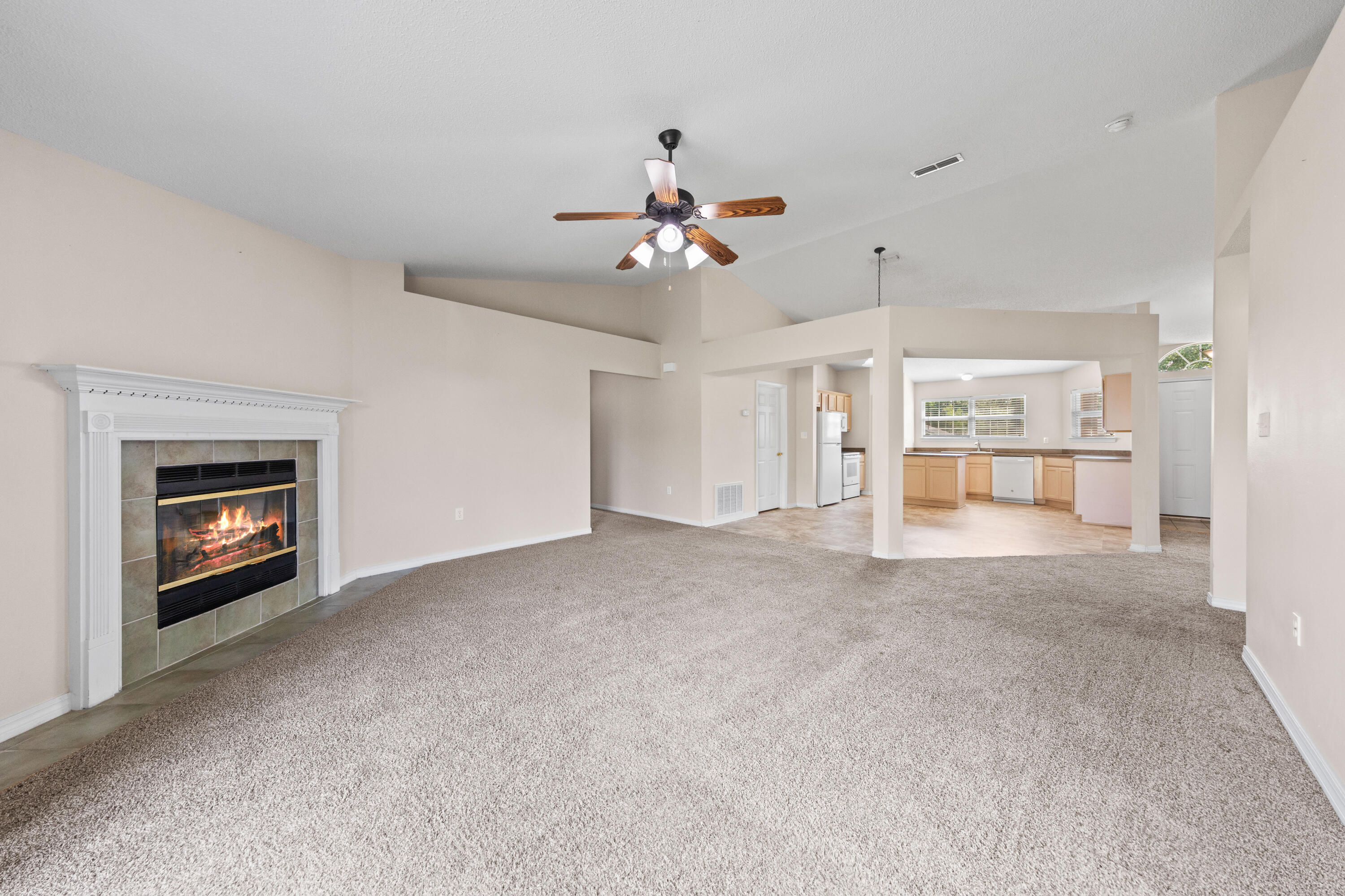275 Limestone Circle Crestview, FL 32539 - Photo 20 of 45 a view of an empty room with a fireplace